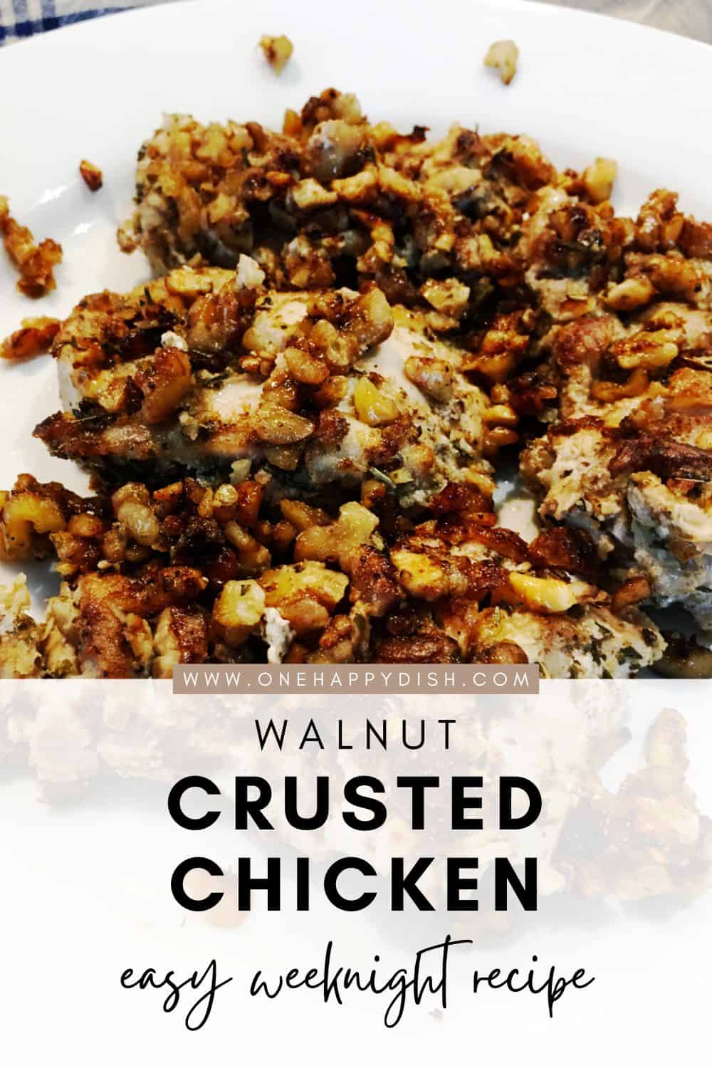 Herb and walnut crusted chicken thighs on a white plate.