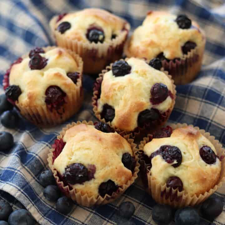 Homemade blueberry muffins with extra blueberries