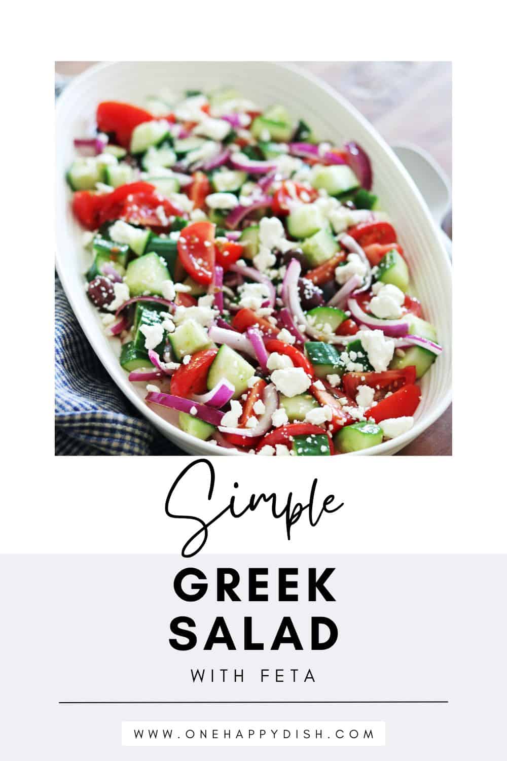 Greek salad on a ceramic beige platter.
