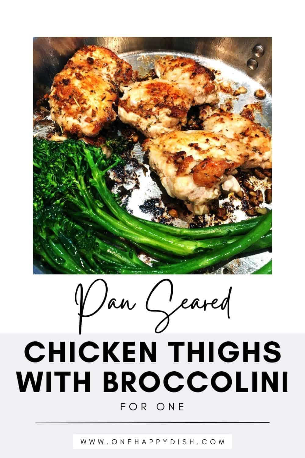 Pan seared chicken thighs and broccolini in a stainless steel skillet.