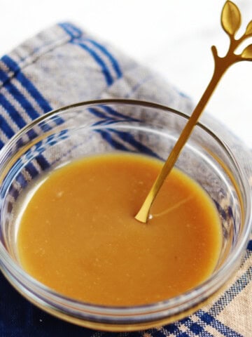 Homemade miso sauce in a small glass bowl.