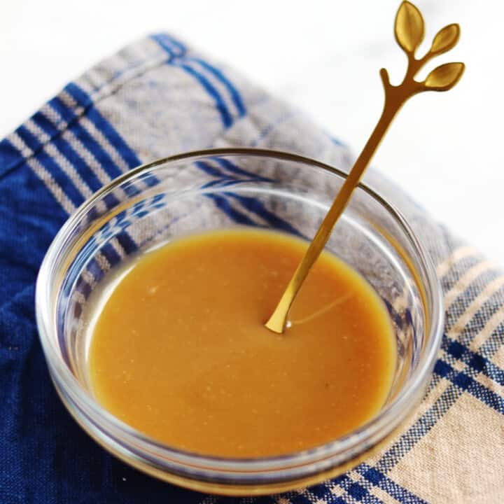 Homemade miso sauce in a small glass bowl.