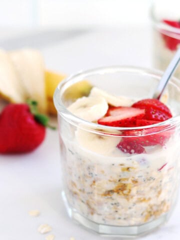 Peanut butter overnight oats topped with strawberry and banana slices.