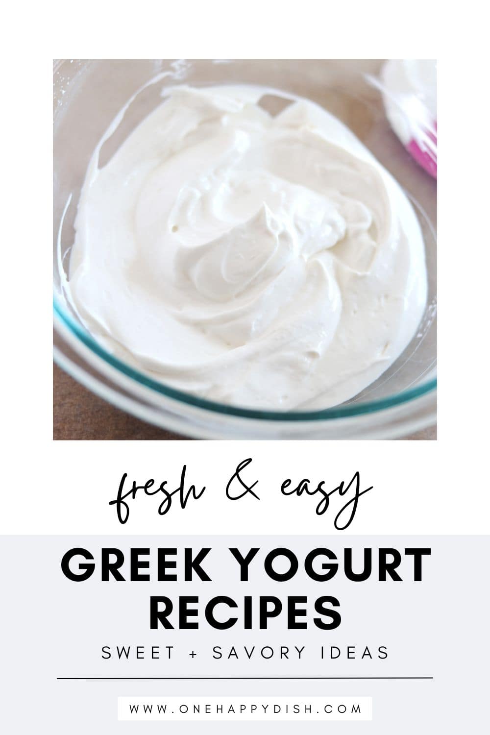 A glass bowl filled with whipped Greek yogurt sits on a countertop. Text below reads: Fresh & Easy Greek Yogurt Recipes | Sweet + Savory Ideas. Website: www.onehappydish.com.