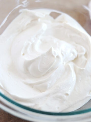 Whipped Greek yogurt with soft peaks.